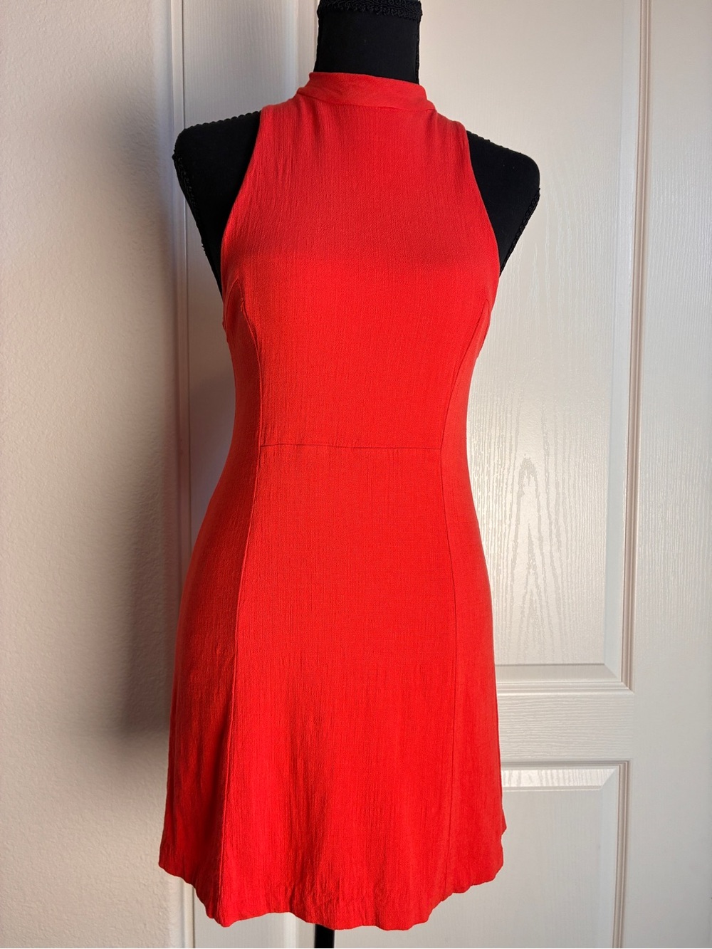 The Free People Kitty Kat Mini Dress in orange is a sleeveless, A-line dress S